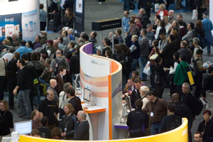 Crowds of people around kiosks