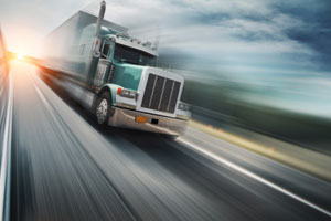 Teal Freight Truck In Motion